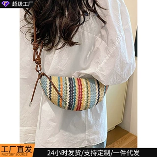 草编包包2026新款秋冬小包编织包休闲女包百搭单肩饺子包沙滩包