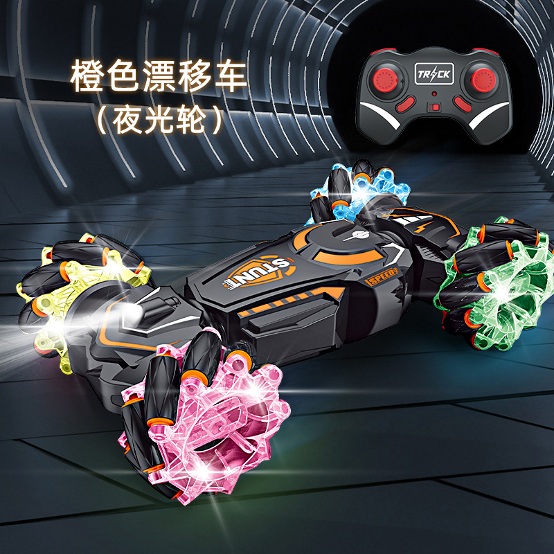 Transfronterizos acrobacias de control remoto de doble cara rueda de luz nocturna luces de deriva lateral fresca música recargable coche de juguete de cuatro tracciones