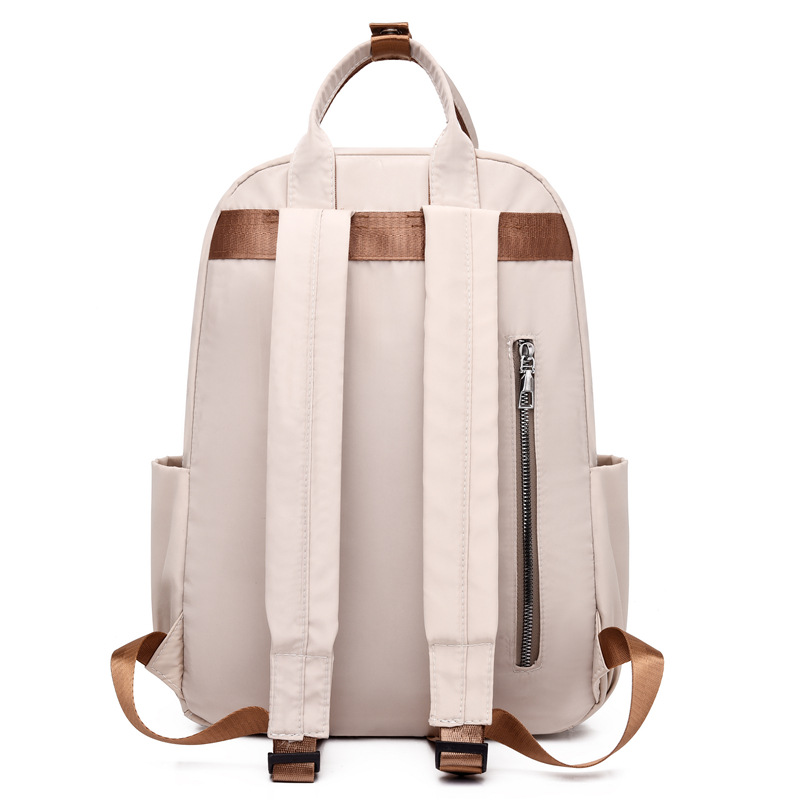 Comercio exterior al por mayor 2023 nueva mochila de nailon súper fuego para mujer, mochila de computadora de gran capacidad de moda para estudiantes