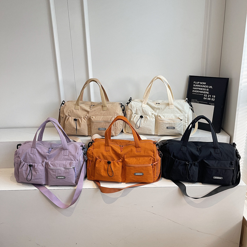 2025 nueva bolsa de viaje de gran capacidad para mujeres ligera separación seca y húmeda nadadora bolsa de equipaje de gimnasio portátil