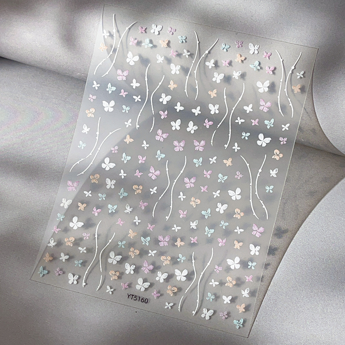 Pegatinas de mariposa de uñas nuevo estilo tridimensional pintado a mano arco de color en relieve exquisito pegamento para uñas decoraciones al por mayor