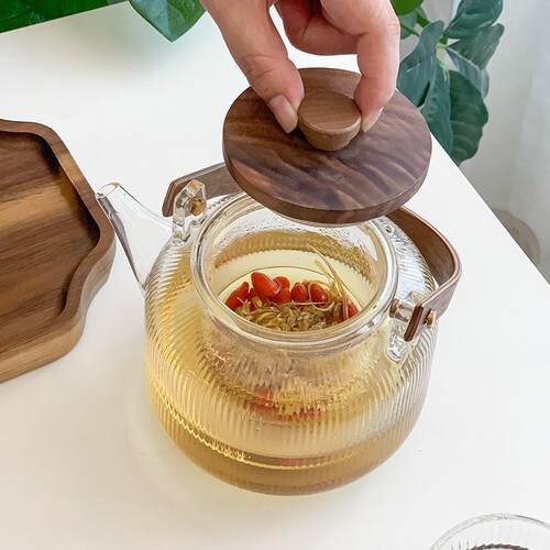 High temperature resistant flower teapot set fruit boiling teapot household steaming integrated wooden handle glass vertical pattern teapot