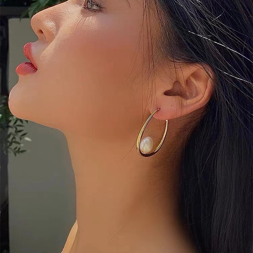 Simple freshwater pearl French-style elegant 14K metal earrings—minimalist hoop designs with a chic, trendy, and uniquely stylish appeal.