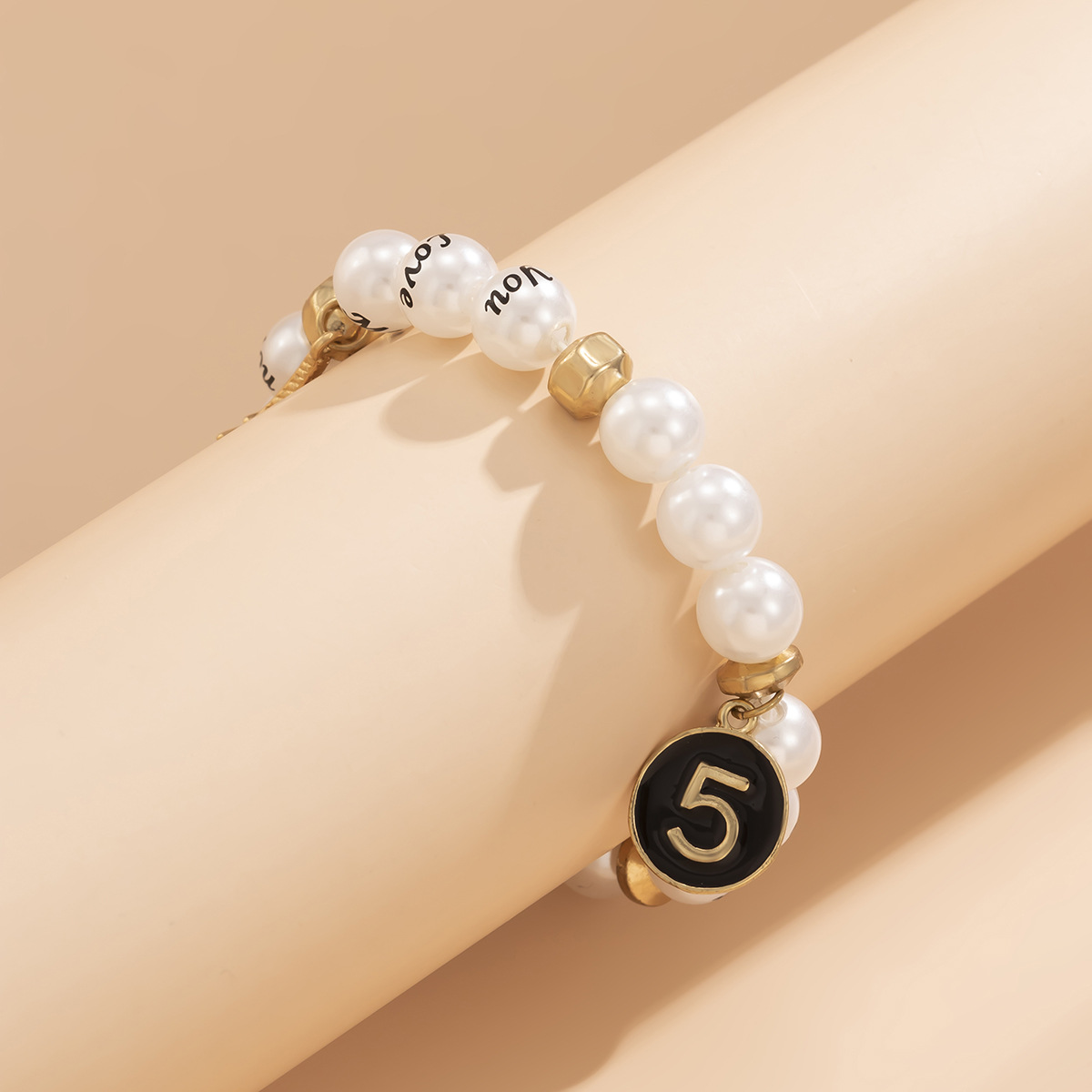 Imitation Pearl Weaving Hand Beaded Simple Letters Retro Leaning Tower Alloy Bracelet display picture 3