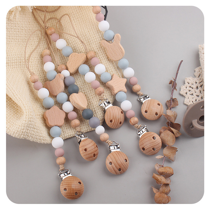Productos para bebés y niños pequeños clip de chupeta creativo bebé dibujos animados juguetes de beech mordida de dientes molares chupeta cadena anti-caída cadena