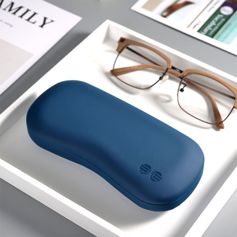 Caja de gafas simple para hombres y mujeres estilo retrógrado estilo portátil anti-presión viaje miopía gafas caja de cáscara