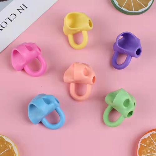 Children's silicone pen holder writing pen holder corrects grip posture primary school students' pen grip corrects three-finger pen holder wholesale