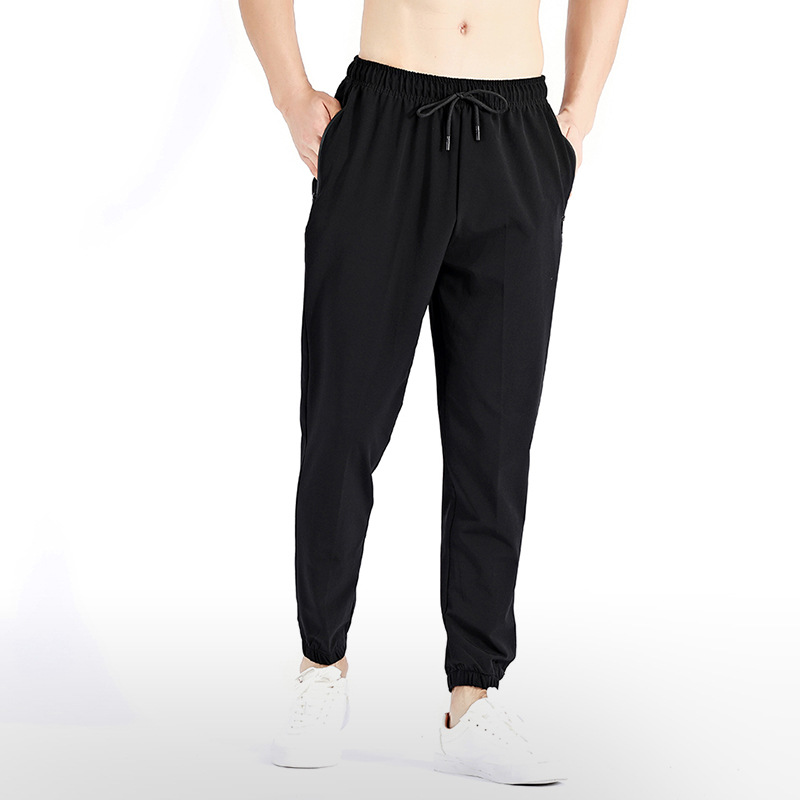 Otoño e invierno Pantalones deportivos al aire libre deportes correr pantalones de hombre ropa casual pantalones de fitness de secado rápido pantalones de chándal de baloncesto pantalones atados al tobillo