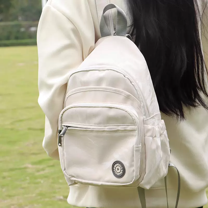 日系ins简约双肩包女休闲韩版百搭斜挎包小众设计通勤学生书包潮