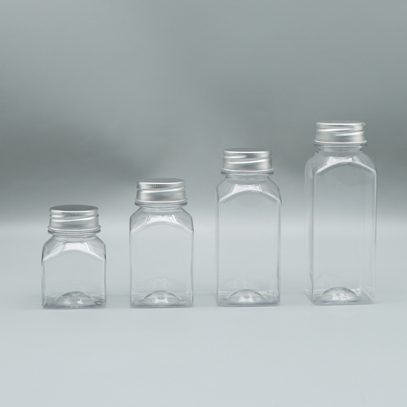 売れ筋の透明な正方形のプラスチックボトルミルクティードリンクボトルキッチン密封缶キャンディージャー食品グレードの蜂蜜ボトル|undefined