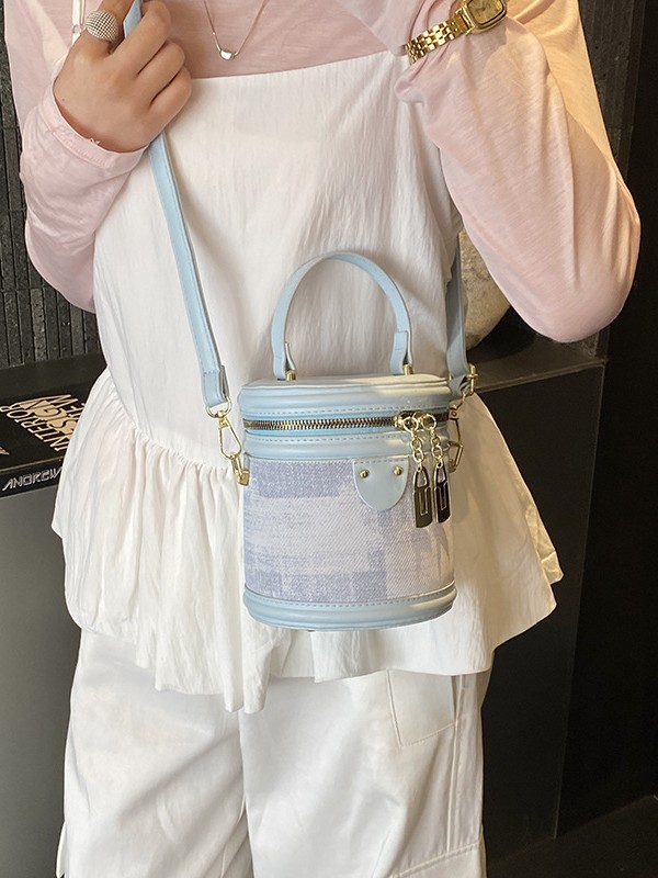 Bolsa de cilindro coreana de diseño popular de nicho 2026 nueva moda simple de hombro portátil bolso de cubo