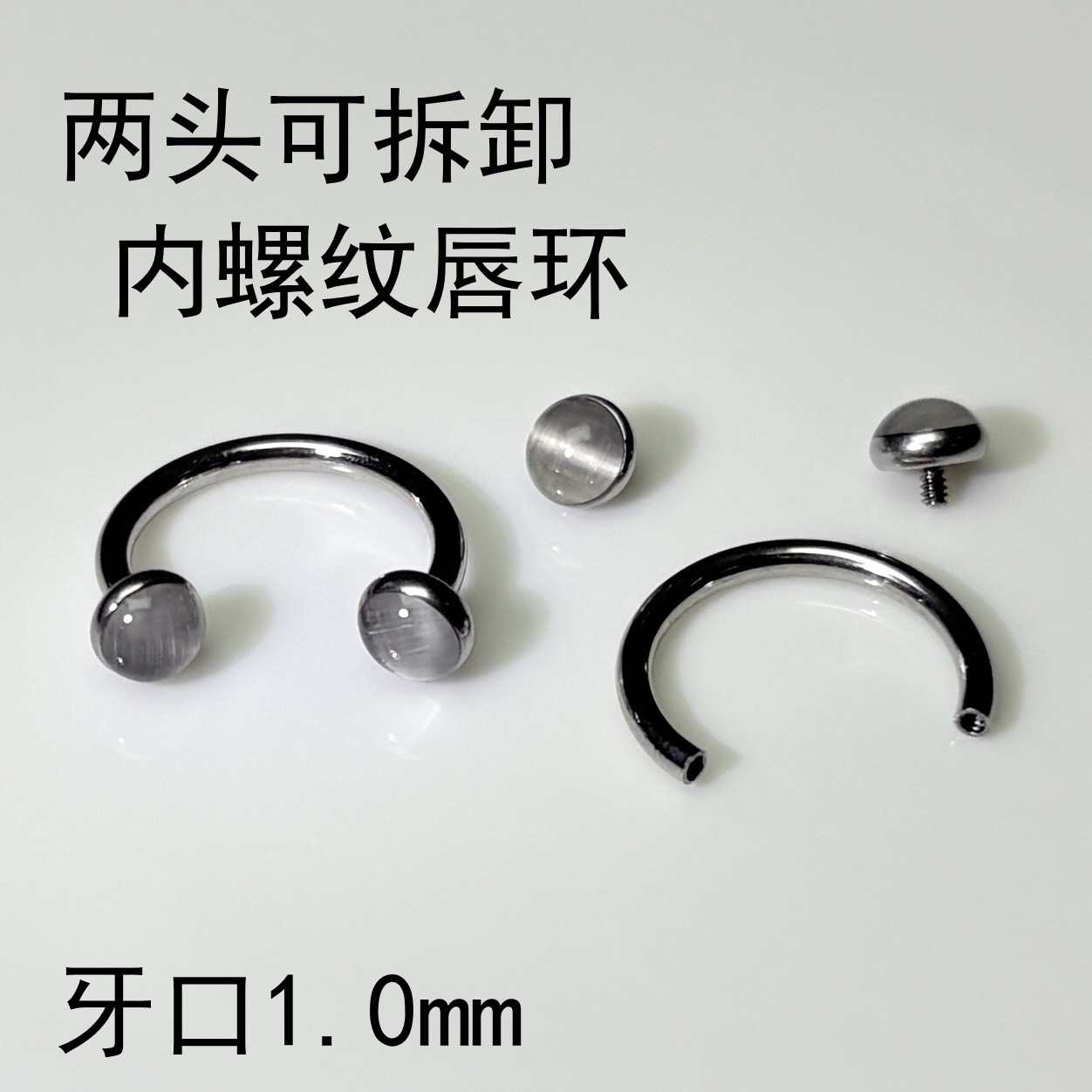 Silver pointed spike labret stud material detail