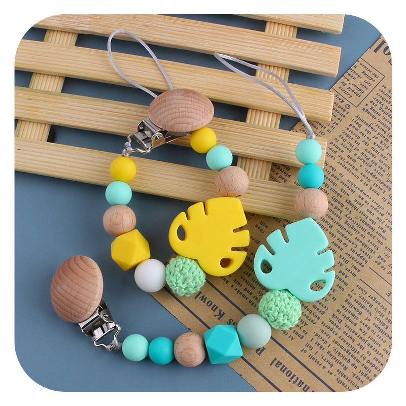 Suministros para bebés Beech chupete clip juguete mordedor bebé calmante hoja de silicona molar Cadena de chupete cadena anti-caída