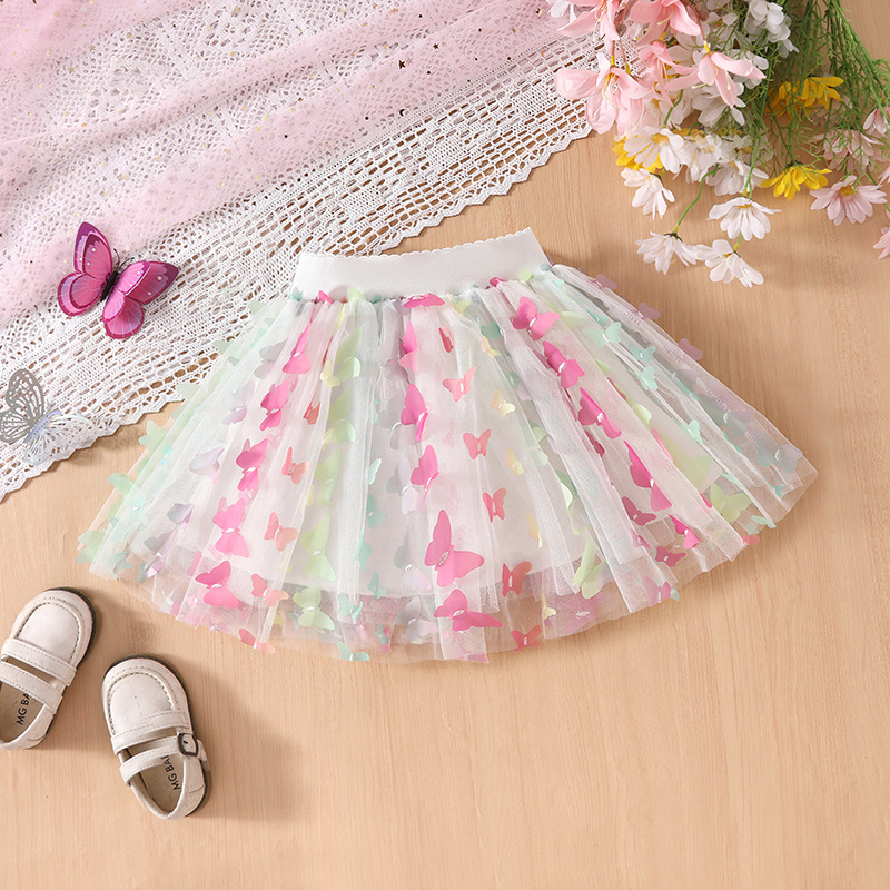 Ropa infantil al por mayor niñas coloridas mariposa tridimensional falda corta de verano falda de princesa de cuatro estaciones y media falda