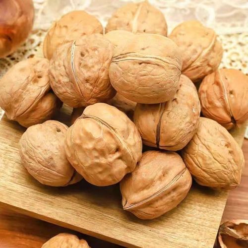 On behalf of Xinjiang 185 paper-skinned walnuts wholesale 500g thin-skinned hand-peeled Aksu large walnuts paper-skinned raw walnuts