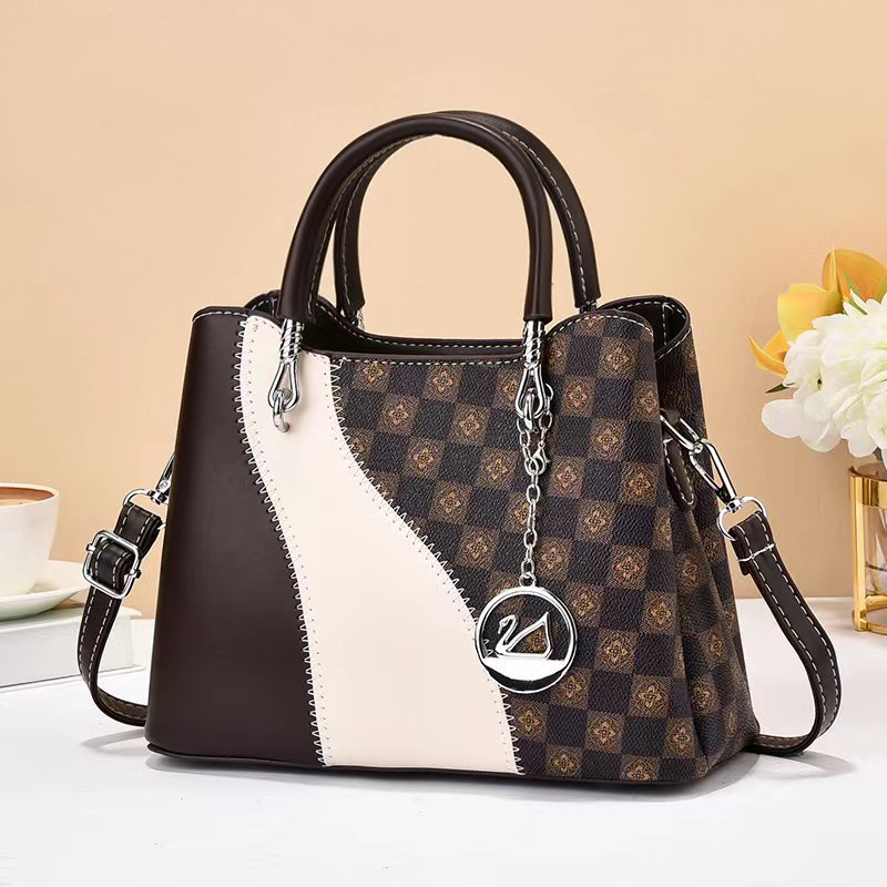 Fabricantes de bolsas de mano de textura nuevas bolsas de mujer de comercio exterior Taizhou bolsas de mujer una bolsa clásica