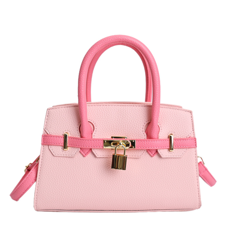 Coreano simple bolso de mano mujer 2026 primavera nueva bolsa de viaje diario texturizada bolso de mochila