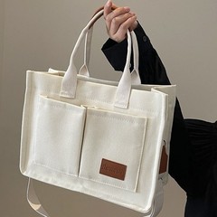 新しい女性のキャンバストートバッグカジュアルレトロポータブルショルダークロスボディマルチポケット大容量スポットクロスボーダースタイル