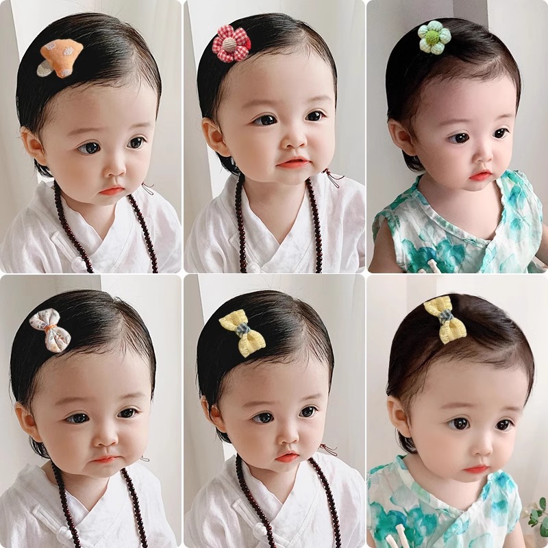 Hermosos clips de cabello de color para niños coreanos de alto nivel sensación de arco de niñas bolsa de tela no daña clips de cabello de bebé