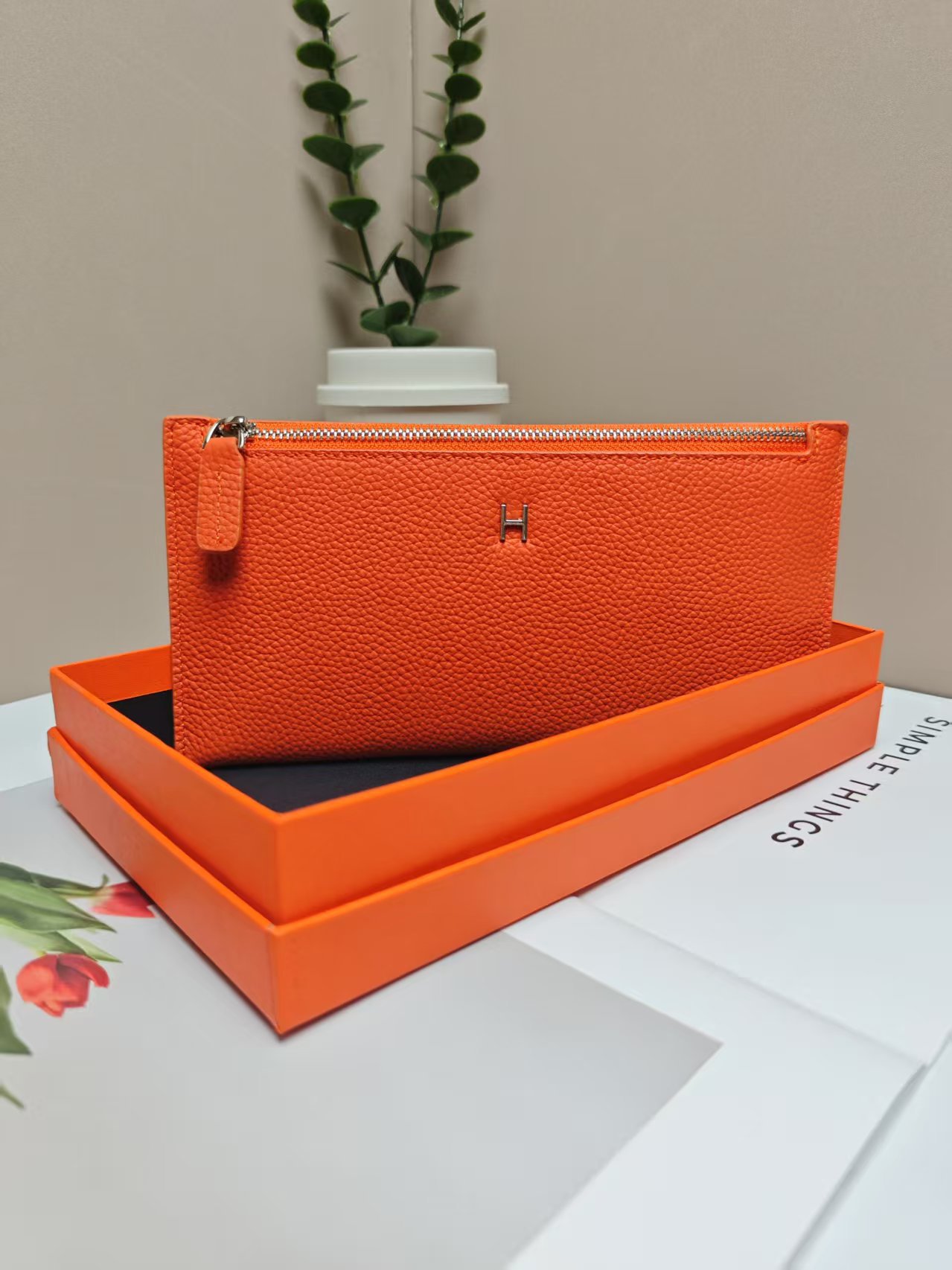 Orange wallet, box, genuine leather