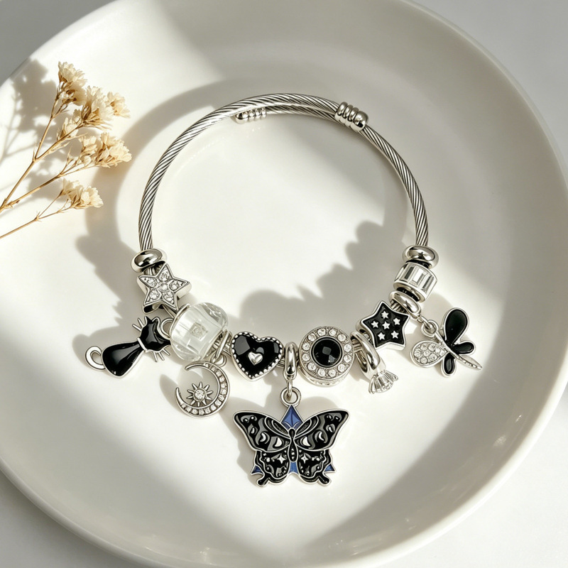 Vintage Niche Black Enamel Butterfly Bracelet with Sparkling Diamonds, Stars, Moon, Black Cat, and Butterfly Pendant, Popular Influencer Accessory Vintage Niche Black Enamel Butterfly Bracelet with Sparkling Diamonds, Stars, Moon, Black Cat, and Butterfly Pendant, Popular Influencer Accessory