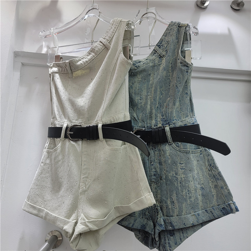 Irregular hombro inclinado cuerpo completo taladro jeans jeans mujeres 2026 verano nuevo diseño sensación de pantalones de pierna ancha pantalones calientes