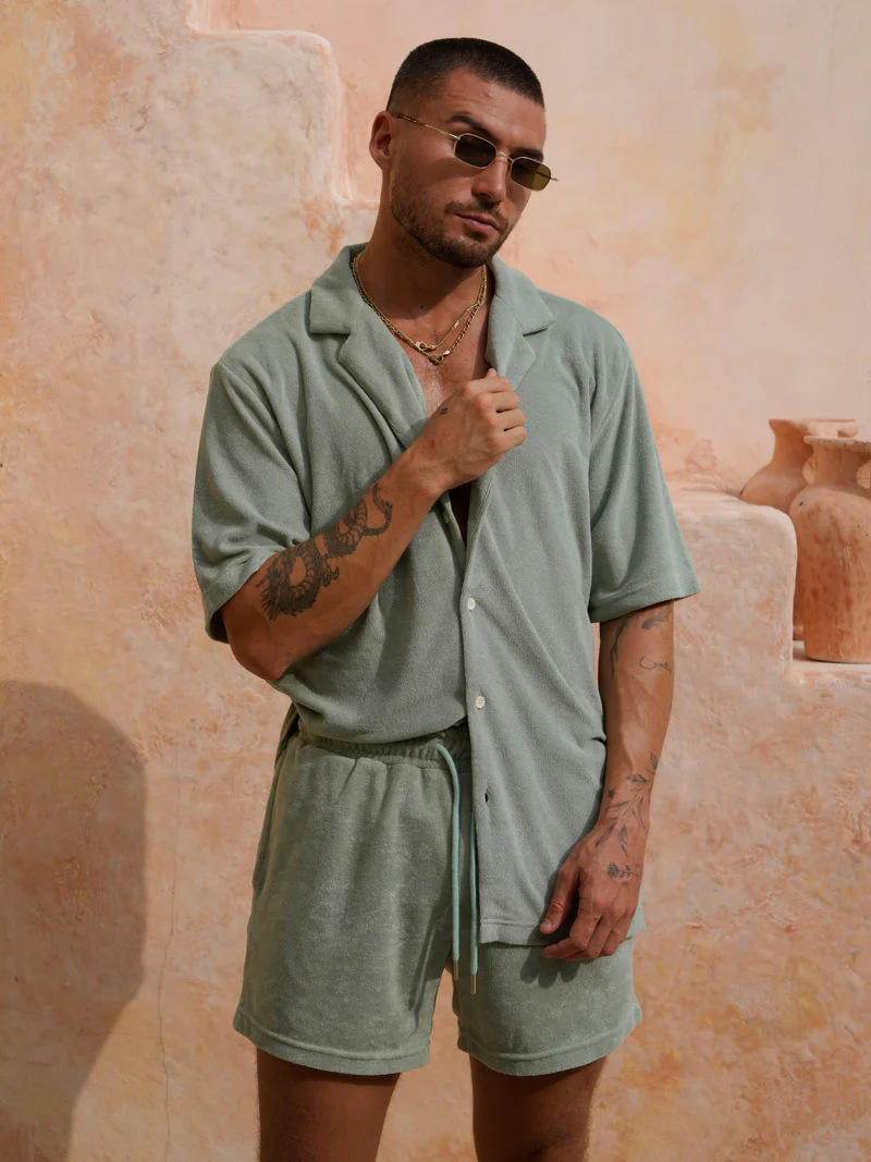 Conjunto masculino de músculos locos, pantalones cortos deportivos y de ocio, sudaderas de verano y blusas de dos piezas, conjunto de códigos europeos transfronterizos masculinos