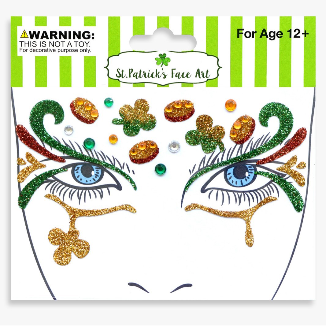 祝日のパーティーの舞台の化粧は顔を貼って化粧のシールを貼ります。