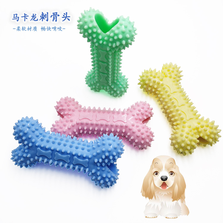 Fábrica al por mayor juguete para mascotas juguete mordedura de perro TPR material macaron perro diente molar limpieza cabeza de hueso juguete