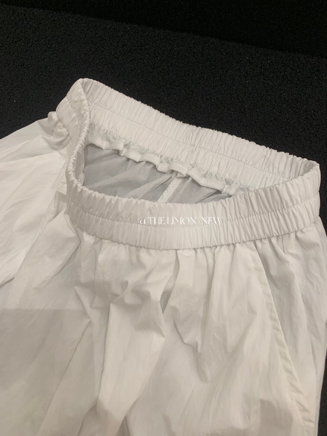 Quần culottes nữ ống rộng cạp cao, phối viền ren xếp tầng, dáng suông rộng, thanh lịch và thoải mái — màu đen, Xanh da trờicolor, màu trắng, Đá vôi chi tiết 48