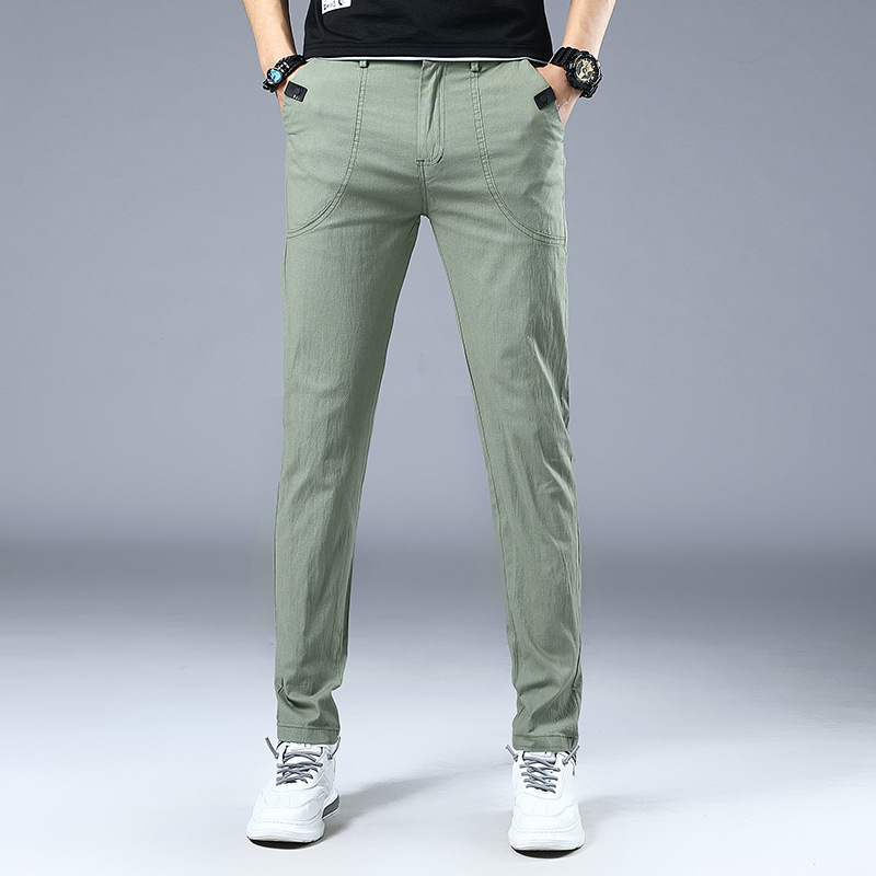 Four Seasons pantalones casuales elásticos para hombres al por mayor de los hombres jóvenes estilo coreano SLIM-Fit adelgazamiento simple moda lápiz pantalones hombres
