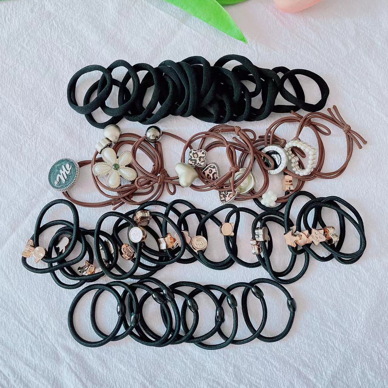 100 mezclado pelo lazo cuerda al por mayor banda de goma femenina carta de caramelo arco banda de pelo Simple temperamento lindo cola de caballo