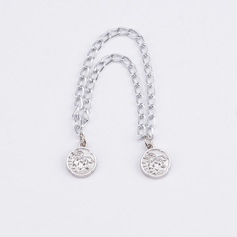 チェーンの磁気はズボンの足を引きずることを防ぎます。金属の磁気は袖口を固定します。