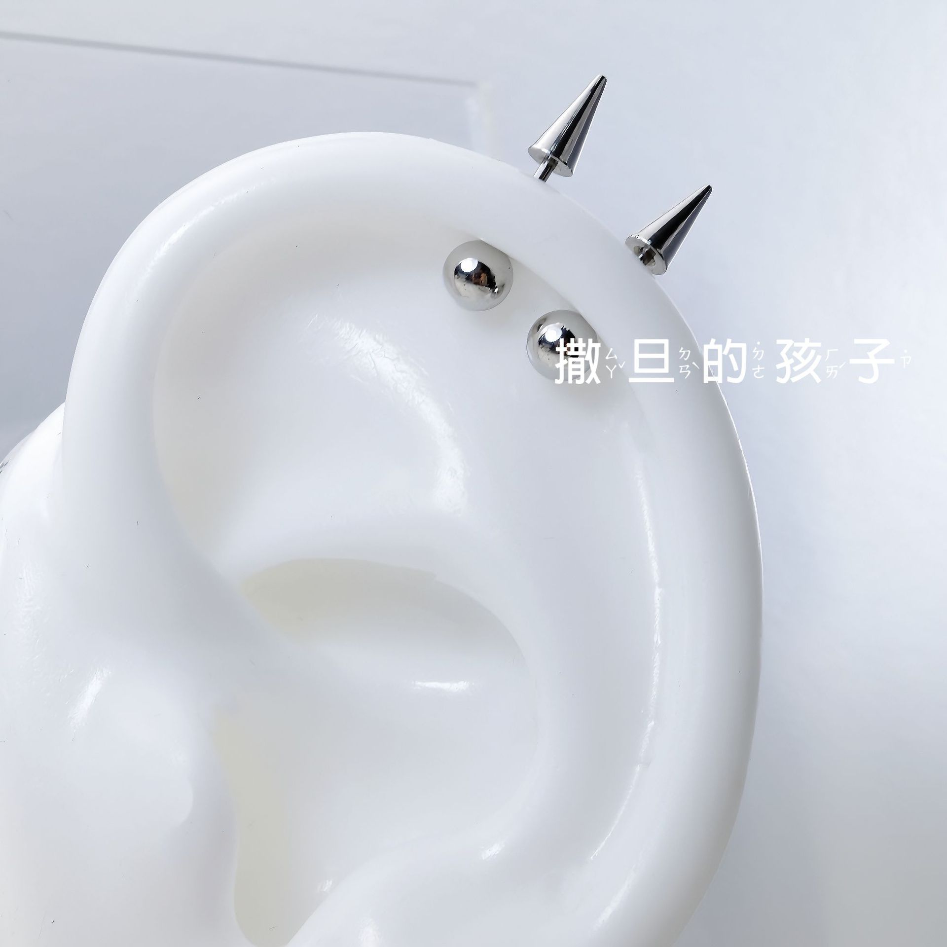 Pointed labret stud close-up product detail