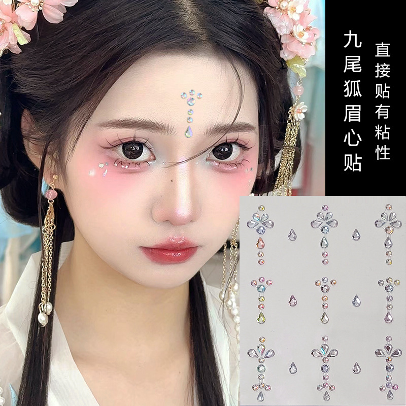 Parche de maquillaje de imitación de celebridades de Internet Parche de diamante Parche de diamante de mariposa Parche de diamante de imitación Parche de cara Parche de lágrima Parche de perlas de ojo Parche de diamante intermitente