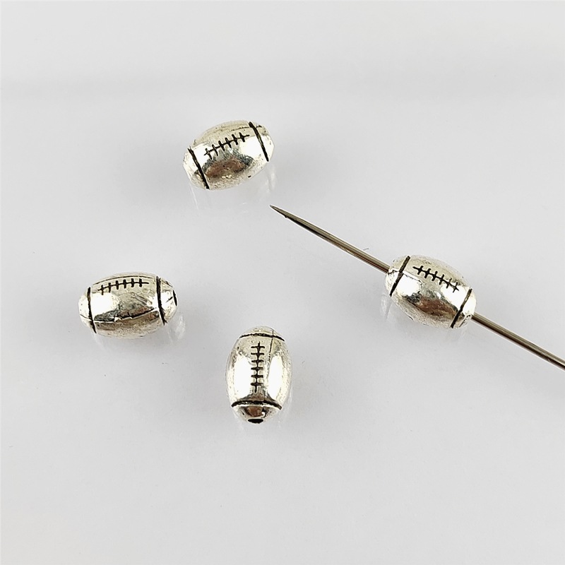 European and American Outdoor Sports Accessories Alloy Personality Rugby Oval Beads Small Aperture Beads