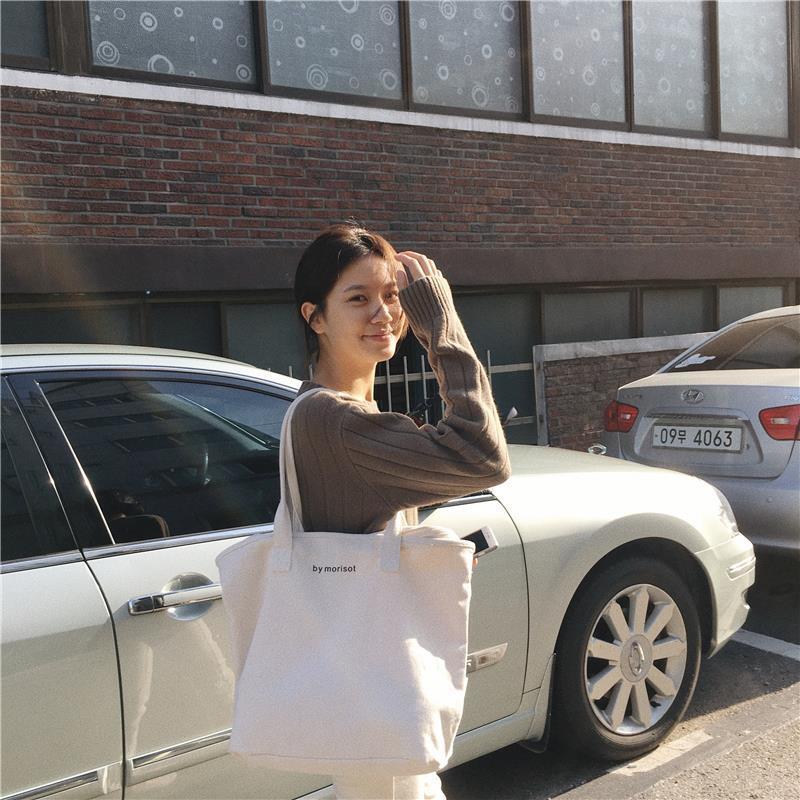 Capacious minimalistic handheld solid color shopping bag