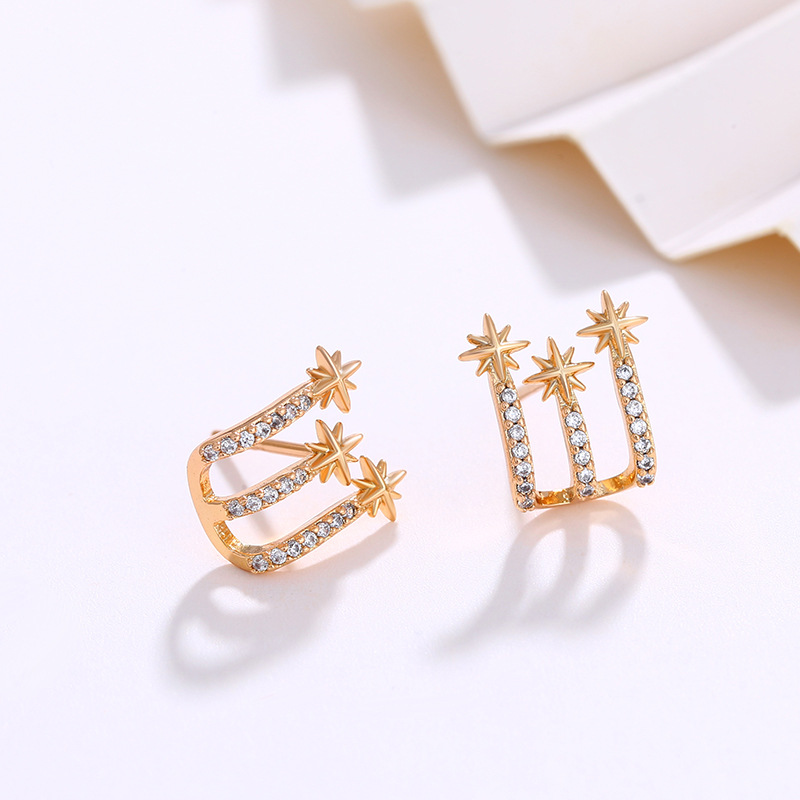 Joyería de Xuping Amazon transfronteriza pendientes de moda femenina nicho diseño sentido apilado ocho Awn estrella pendientes al por mayor