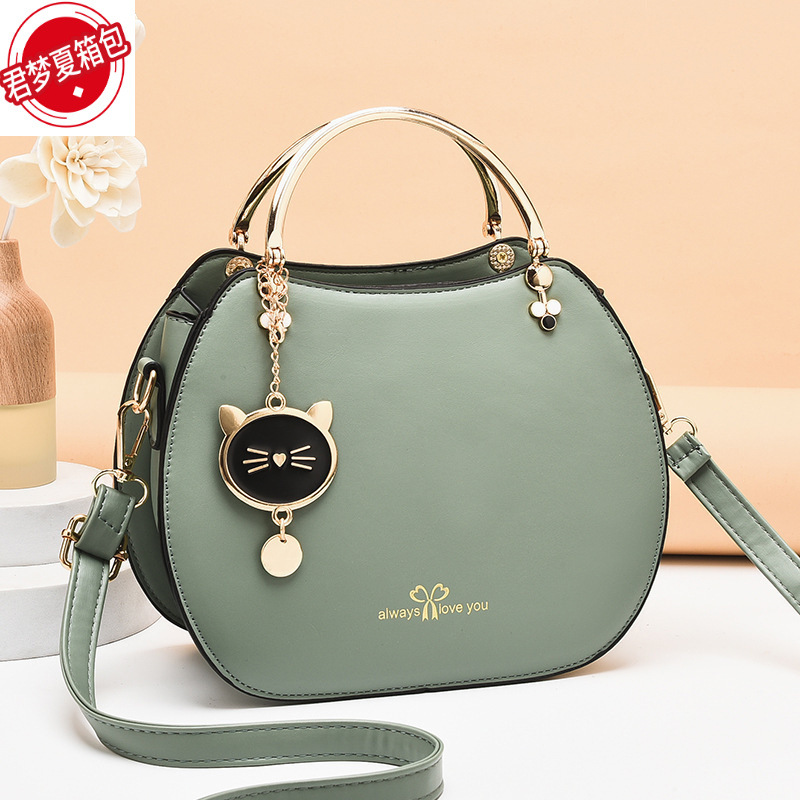 Bolso de las mujeres 2024 estilo coreano moda chica estilo Shell bolsa estilo occidental gato mensajero bolso de hombro de las mujeres