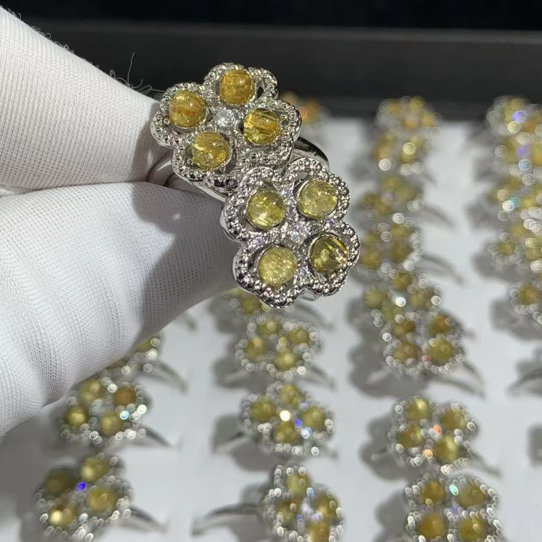 Wholesale natural golden rutilated quartz four-leaf clover ring, fashionable and versatile, a popular cross-border product, direct from the manufacturer