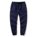 Royal blue pants with red label