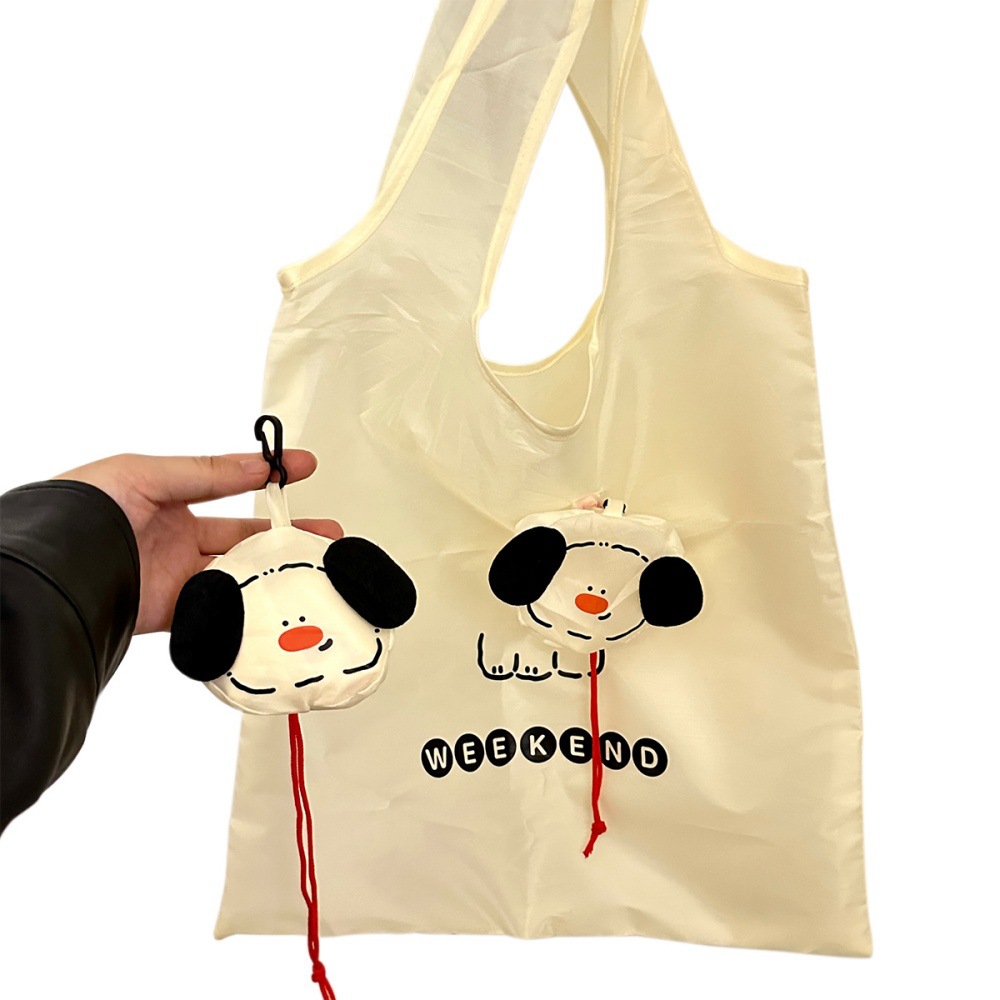 Tengyi original ins viento caricatura cachorro bolsa de almacenamiento plegable bolsa de compras portátil de gran capacidad bolsa ecológica