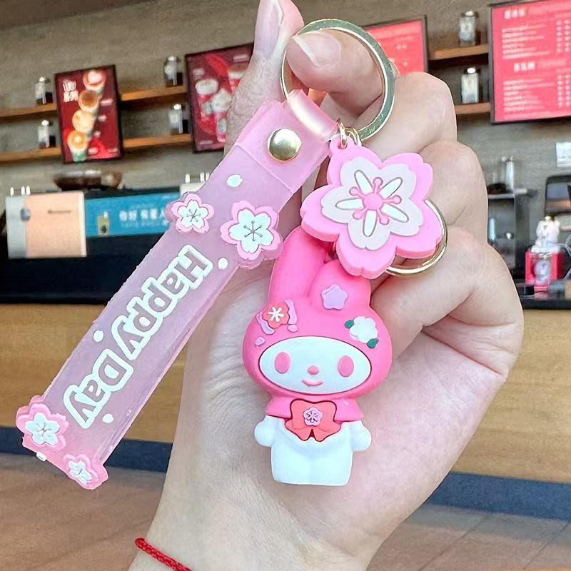 Perro de orejas grandes Melody KT gato pudín perro Kolomi caricatura de silicona llavero colgante bolsa colgante caja ciega regalo