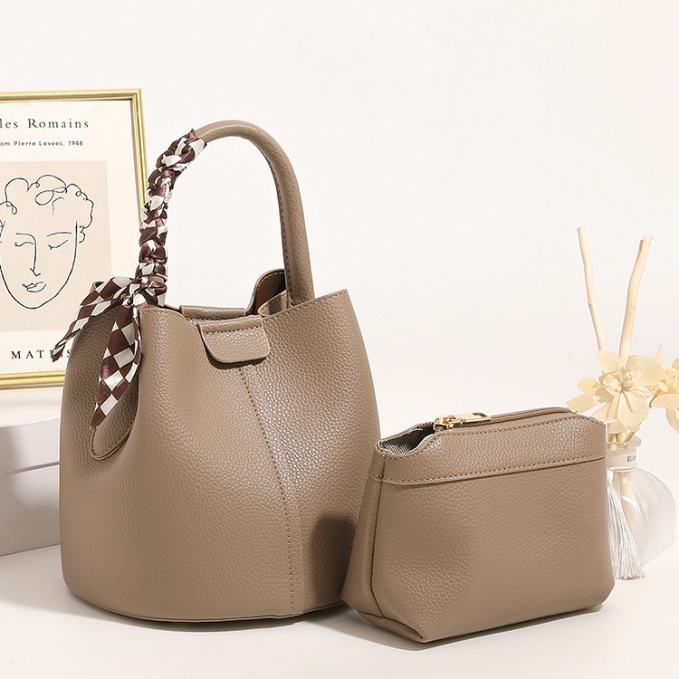 Comprar bolso femenino 2025 primavera y verano bolso de cubo bolso de cercanías moda de alta gama bolso de mensajero de todo fósforo