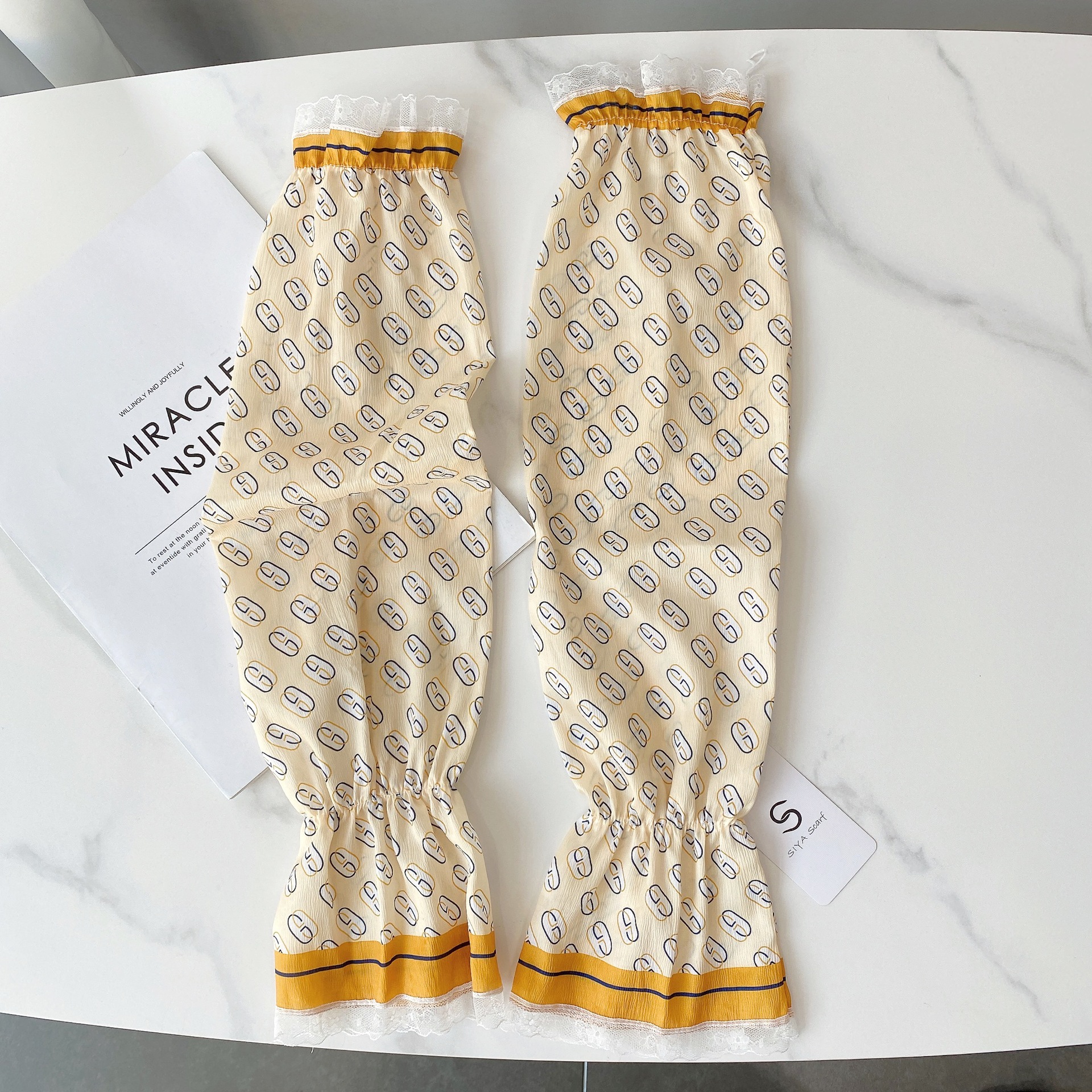 Verano estilo coreano ligero transpirable overse manga de encaje de las mujeres protección solar fresca manga de hielo satinado protección del brazo de conducción al aire libre al por mayor