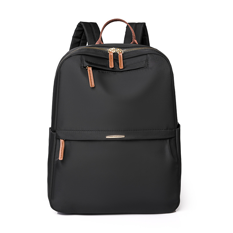 En stock al por mayor 2024 nuevas mujeres mochila de nylon simple color sólido gran capacidad ordenador mochila estudiante