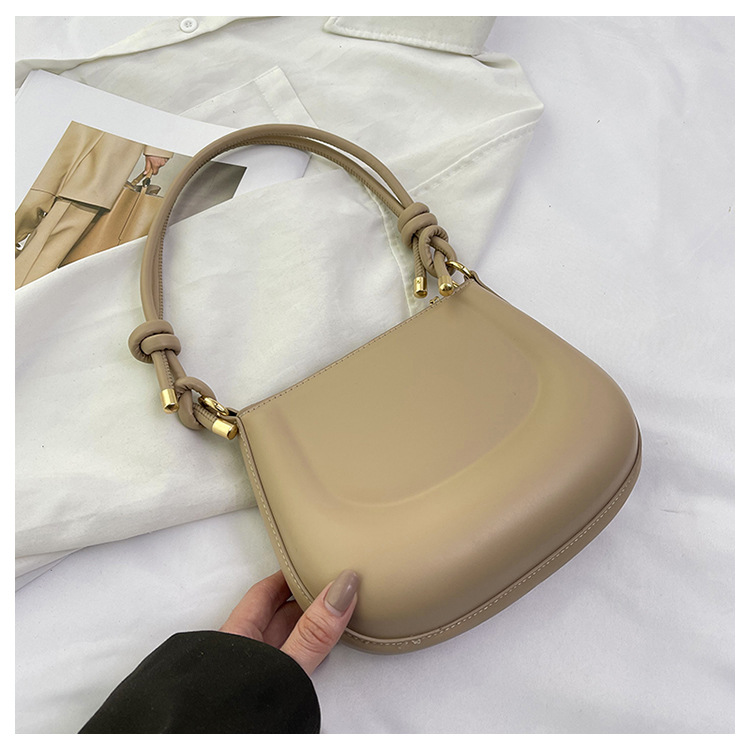 Textura color caramelo nuevo bolso femenino portátil moda moda bolso de hombro estilo occidental bolso de axila simple bolso de silla dulce