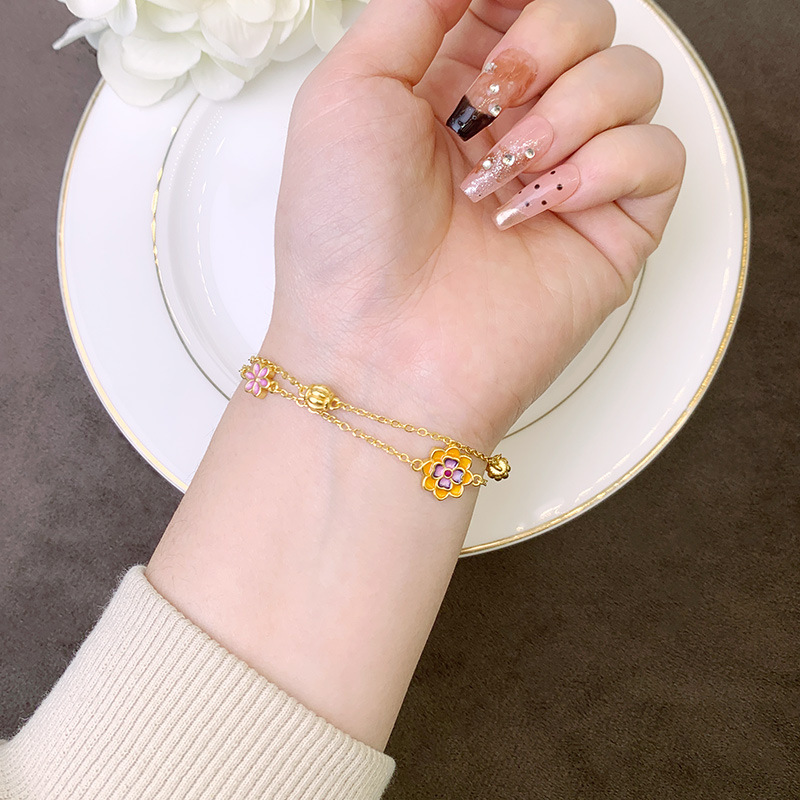 Nueva pulsera de oro antiguo estilo chino estilo nacional esmalte color loto goteo flor de melocotón pulsera nicho joyas de alta calidad