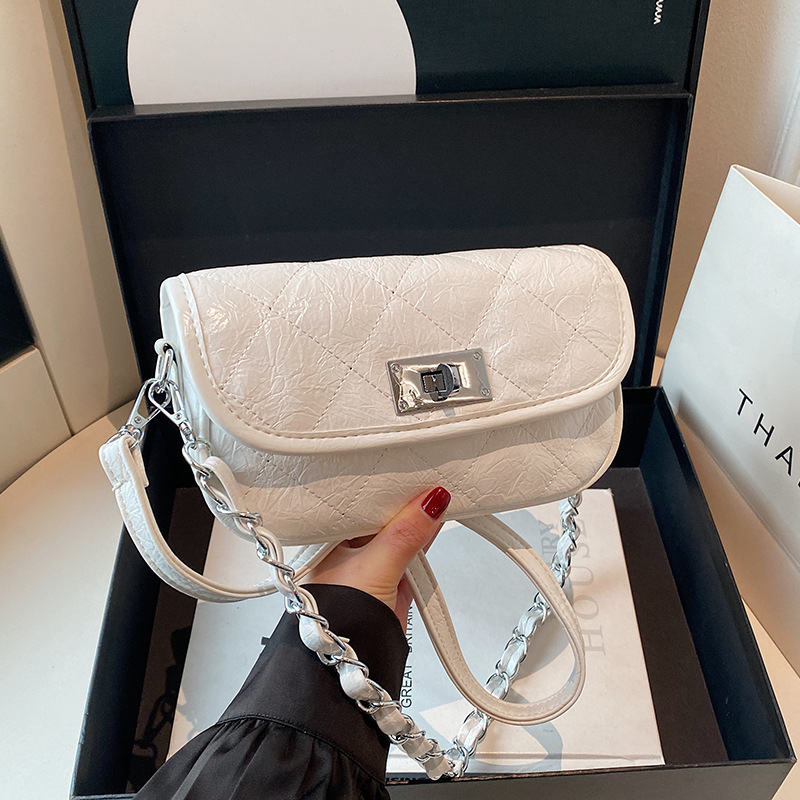 Bolso de cadena de rombos de fragancia pequeña de alta gama transfronteriza, bolso de mensajero de un solo hombro simple de moda, bolso de axila casual de todo fósforo para mujer
