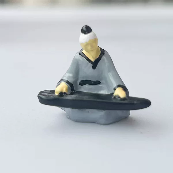 Slate gray poet playing the piano